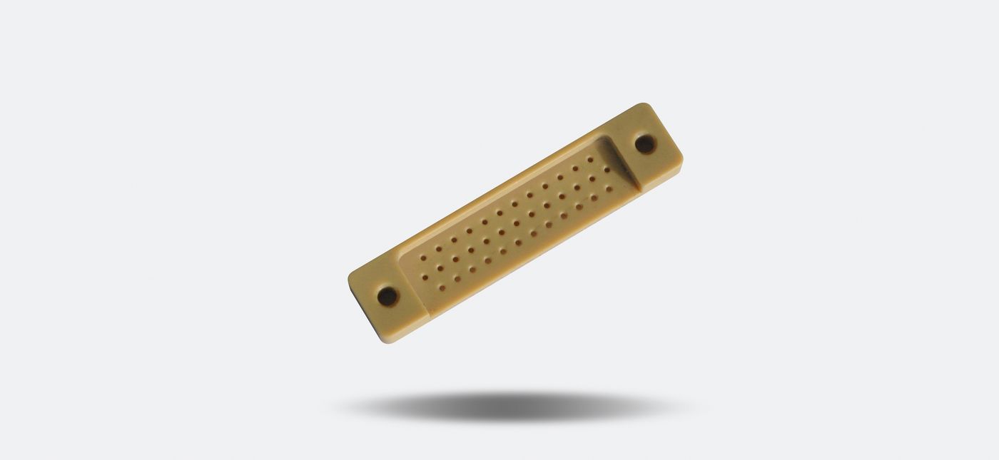 Precision micro-machined engineering-plastic part (11)